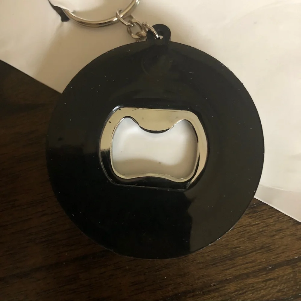 Tucks Ride Me Bottle Opener Keychain NWOT